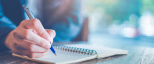 writing in notebook