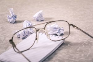 Crumbled Paper and Notebook